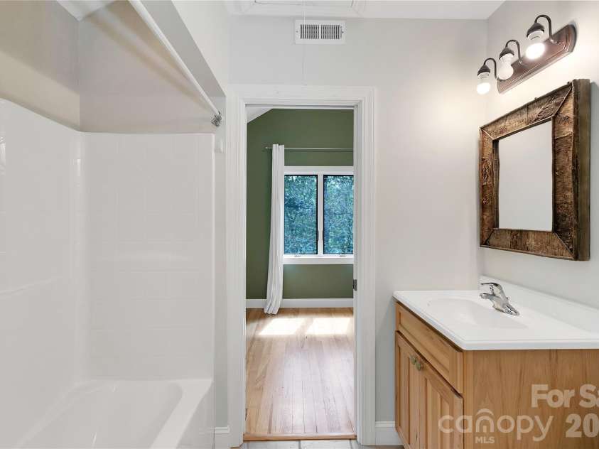 72 Memory Lane, Brevard, NC 28712.  MLS# CAR4352602, YatesRealty ID 47474. Upper level bath
