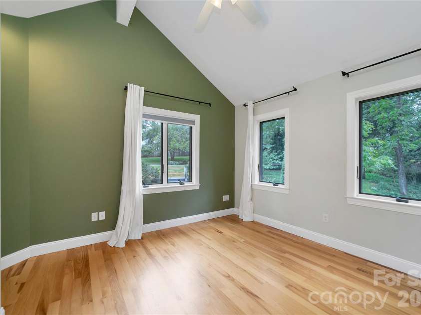 72 Memory Lane, Brevard, NC 28712.  MLS# CAR4352602, YatesRealty ID 47474. Upper level bedroom