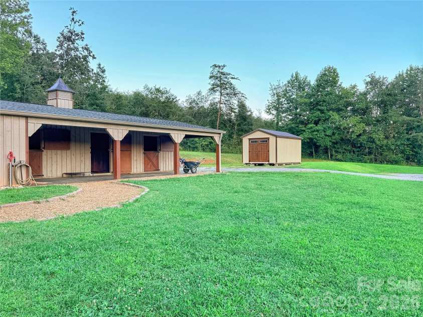 1091 Bill Collins Road, Columbus, NC 28722.  MLS# CAR4416811, YatesRealty ID 47476. Barn and new shed