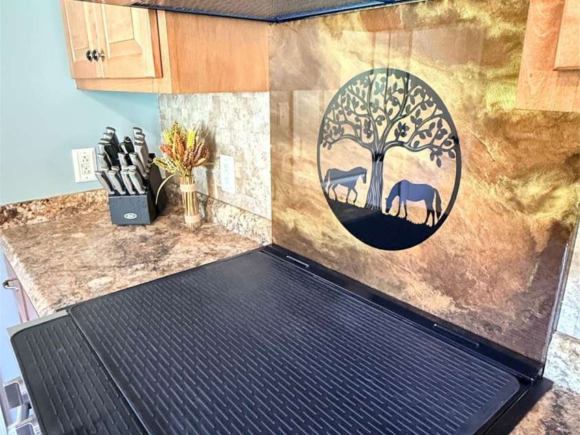 1091 Bill Collins Road, Columbus, NC 28722.  MLS# CAR4416811, YatesRealty ID 47476. Custom Resin Range Backsplash