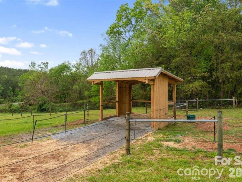 1091 Bill Collins Road, Columbus, NC 28722.  MLS# CAR4416811, YatesRealty ID 47476. Run In Shed