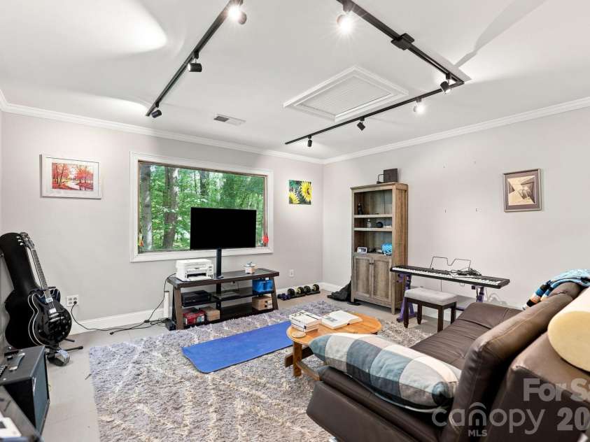 205 Dornoch Drive, Matthews, NC 28104.  MLS# CAR4417677, YatesRealty ID 47477. Flex Space on 2nd Floor of Workshop