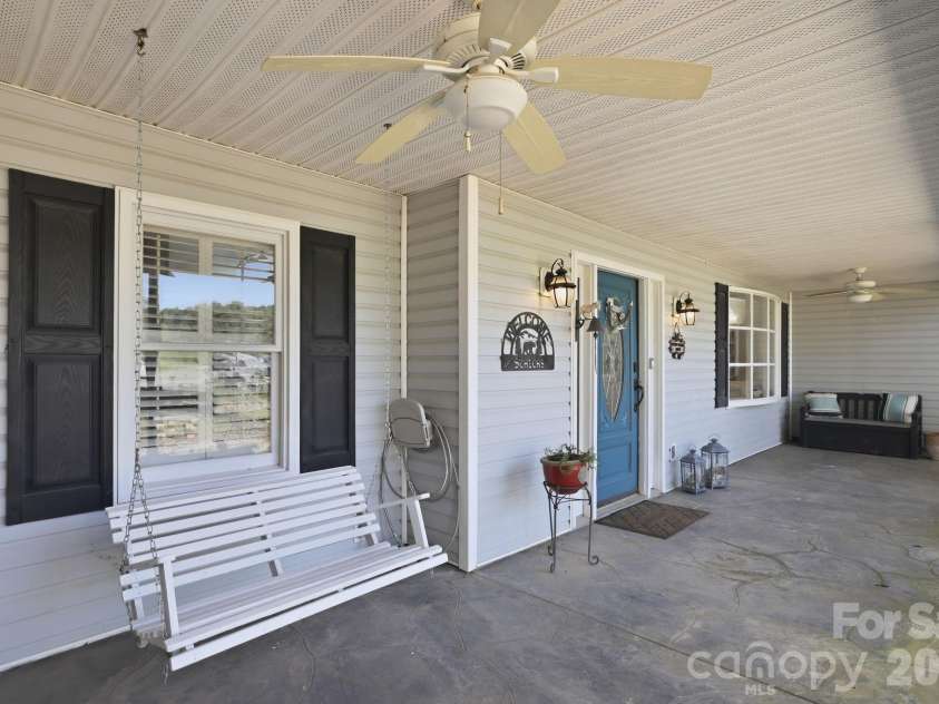 205 Dornoch Drive, Matthews, NC 28104.  MLS# CAR4417677, YatesRealty ID 47477. Front Porch