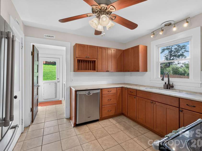 780 Jupiter Road, Weaverville, NC 28787.  MLS# CAR4417969, YatesRealty ID 47480. Access to Mud Room / Backyard