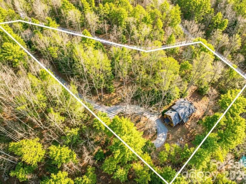 553 River Bend Drive, Mars Hill, NC 28754.  MLS# CAR4418089, YatesRealty ID 47487. 3.77 acres of forested land in a private development.