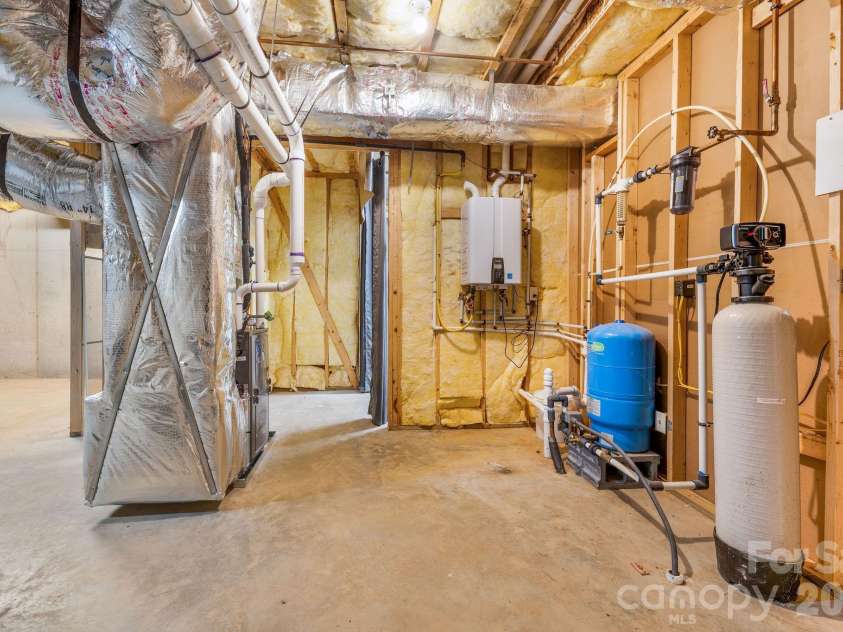 553 River Bend Drive, Mars Hill, NC 28754.  MLS# CAR4418089, YatesRealty ID 47487. Clean utility room in basement.