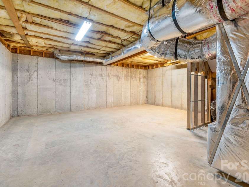 553 River Bend Drive, Mars Hill, NC 28754.  MLS# CAR4418089, YatesRealty ID 47487. Large and clean basement space waiting for your creative use.
