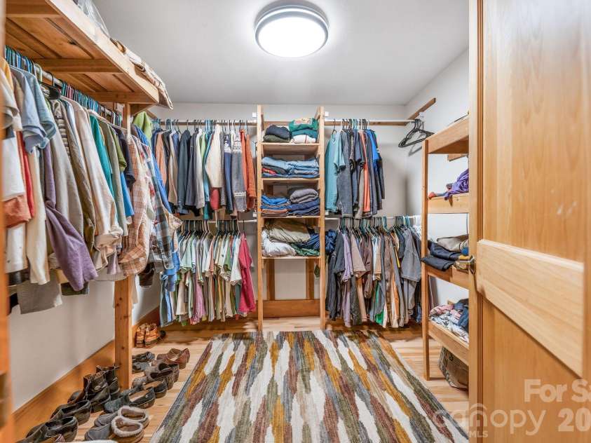 553 River Bend Drive, Mars Hill, NC 28754.  MLS# CAR4418089, YatesRealty ID 47487. Large closet in the primary suite.