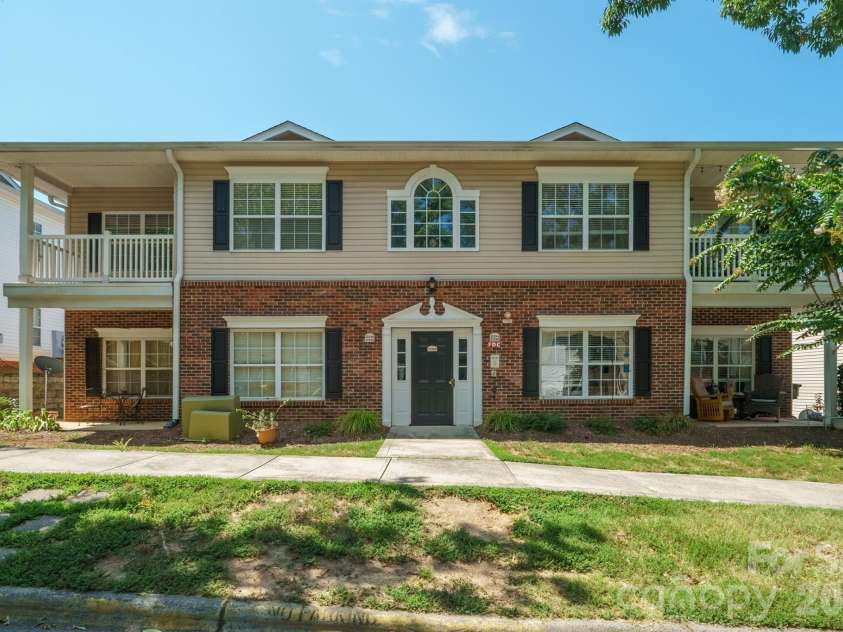 21246 Hickory Street, Cornelius, NC 28031.  MLS# CAR4417839, YatesRealty ID 47488. Brick and vinyl secured building