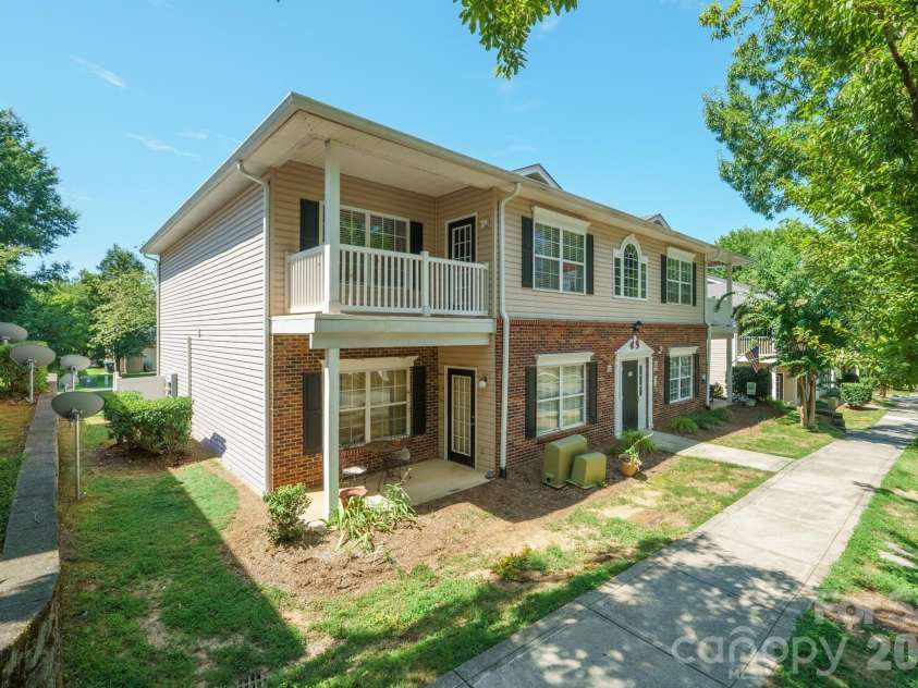 21246 Hickory Street, Cornelius, NC 28031.  MLS# CAR4417839, YatesRealty ID 47488. Corner of building unit