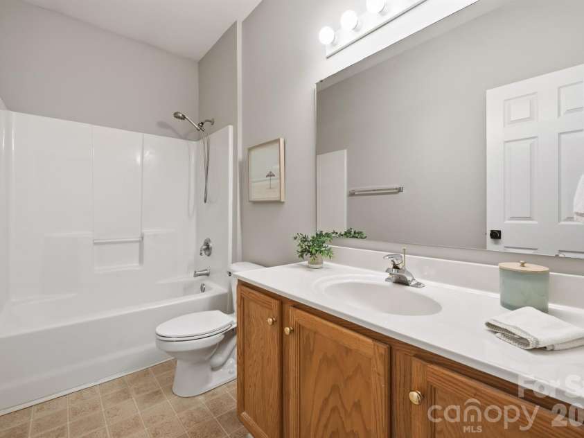 21246 Hickory Street, Cornelius, NC 28031.  MLS# CAR4417839, YatesRealty ID 47488. Hall full bath