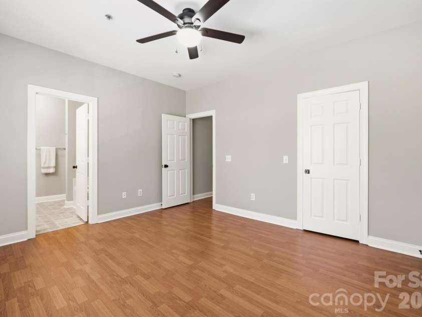 21246 Hickory Street, Cornelius, NC 28031.  MLS# CAR4417839, YatesRealty ID 47488. Nice size walk in closet in primary