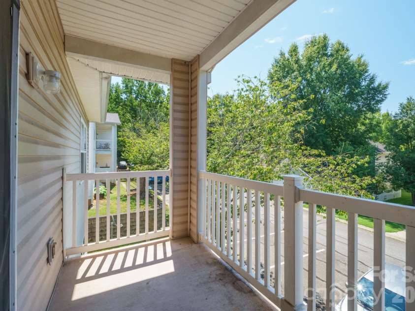 21246 Hickory Street, Cornelius, NC 28031.  MLS# CAR4417839, YatesRealty ID 47488. Rear balcony
