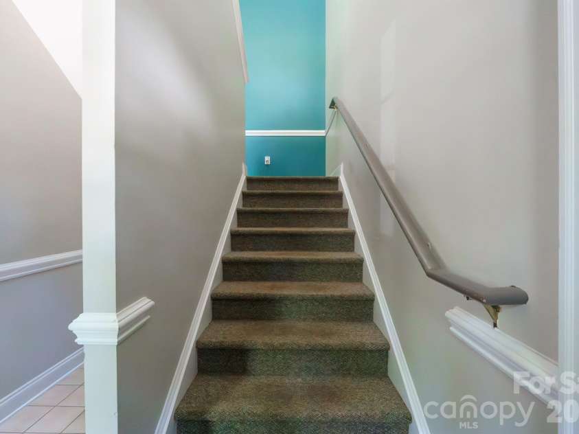 21246 Hickory Street, Cornelius, NC 28031.  MLS# CAR4417839, YatesRealty ID 47488. Secured entryway access to building by code or ring guest in