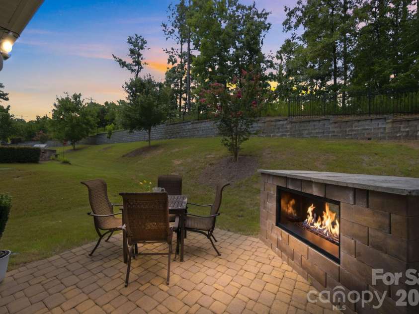 517 Cellini Place, Mount Holly, NC 28120.  MLS# CAR4408060, YatesRealty ID 47490. Fireplace on back pation