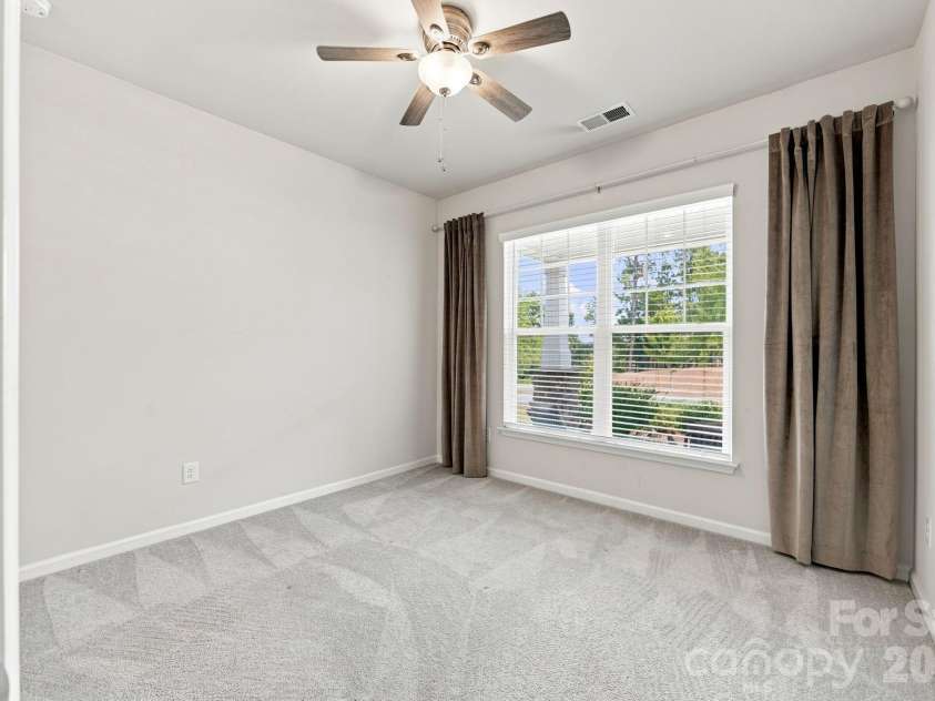 517 Cellini Place, Mount Holly, NC 28120.  MLS# CAR4408060, YatesRealty ID 47490. Guest bedroom on main