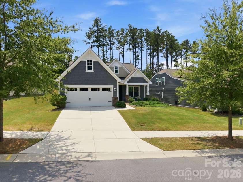 517 Cellini Place, Mount Holly, NC 28120.  MLS# CAR4408060, YatesRealty ID 47490. Power washed drive, walkway, front and back patios. Home, soft washed.