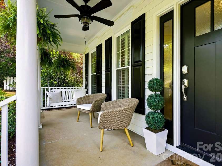 224 Kimberly Road, Davidson, NC 28036.  MLS# CAR4417649, YatesRealty ID 47497. Coffee on the porch
