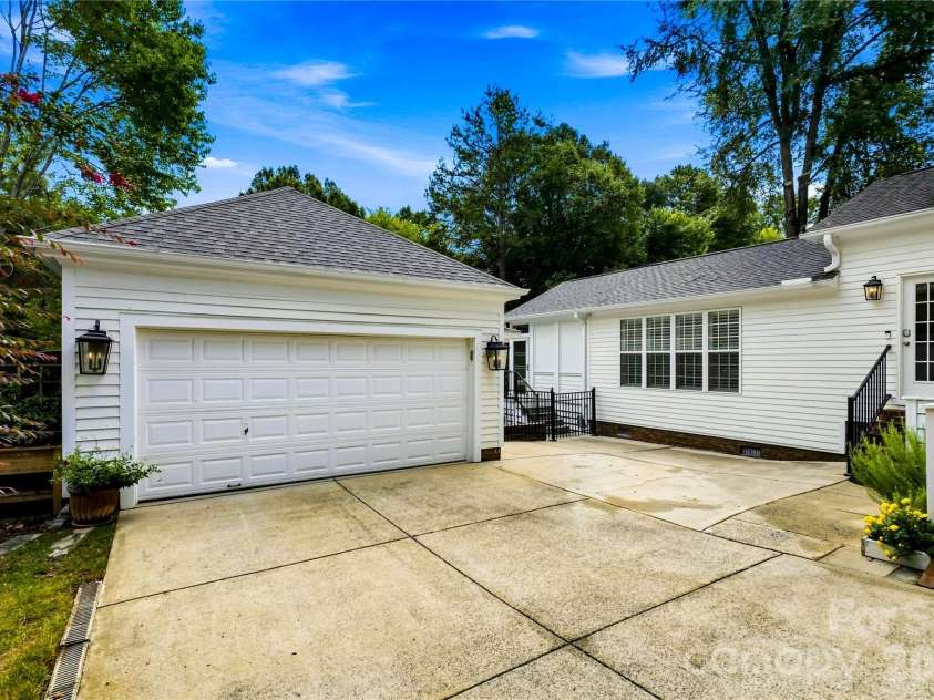 224 Kimberly Road, Davidson, NC 28036.  MLS# CAR4417649, YatesRealty ID 47497. Detached garage and parking area