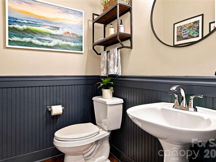 224 Kimberly Road, Davidson, NC 28036.  MLS# CAR4417649, YatesRealty ID 47497. Half bath on main with beadboard accents