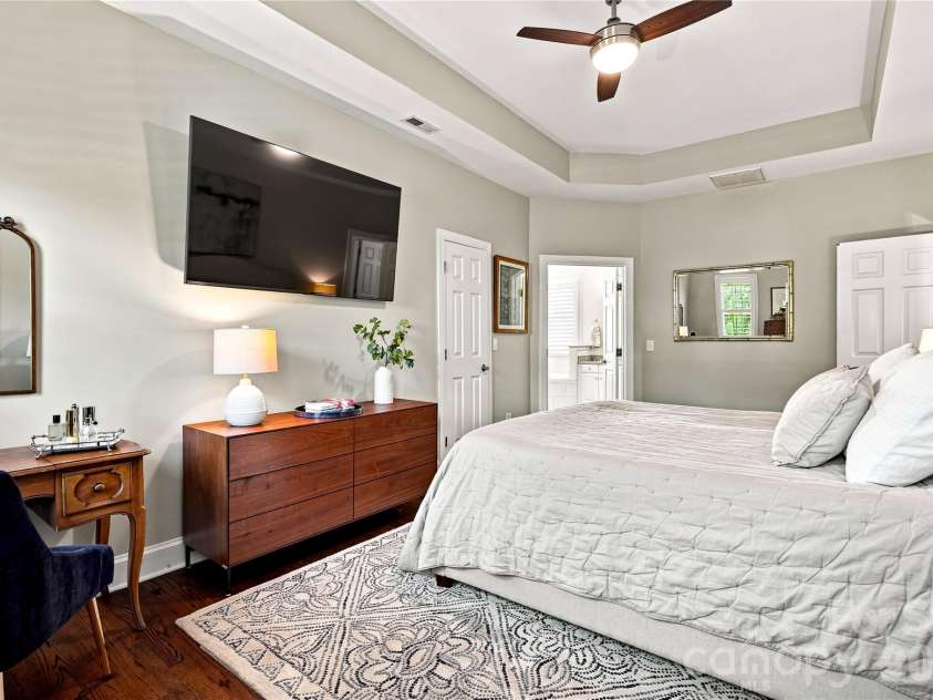 224 Kimberly Road, Davidson, NC 28036.  MLS# CAR4417649, YatesRealty ID 47497. Primary bedroom with tray ceiling and 2 WIC