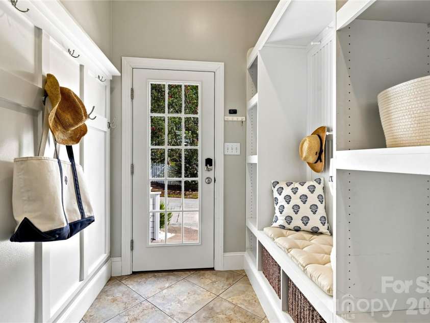 224 Kimberly Road, Davidson, NC 28036.  MLS# CAR4417649, YatesRealty ID 47497. Side door entrance with drop zone