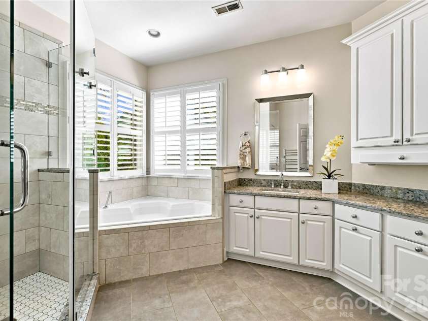 224 Kimberly Road, Davidson, NC 28036.  MLS# CAR4417649, YatesRealty ID 47497. Updated primary bath with soaking tub