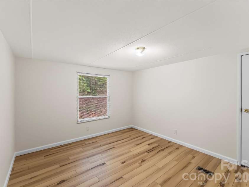 390 Stacy Hollow Drive, Marion, NC 28752.  MLS# CAR4419206, YatesRealty ID 47528. 3rd bedroom
