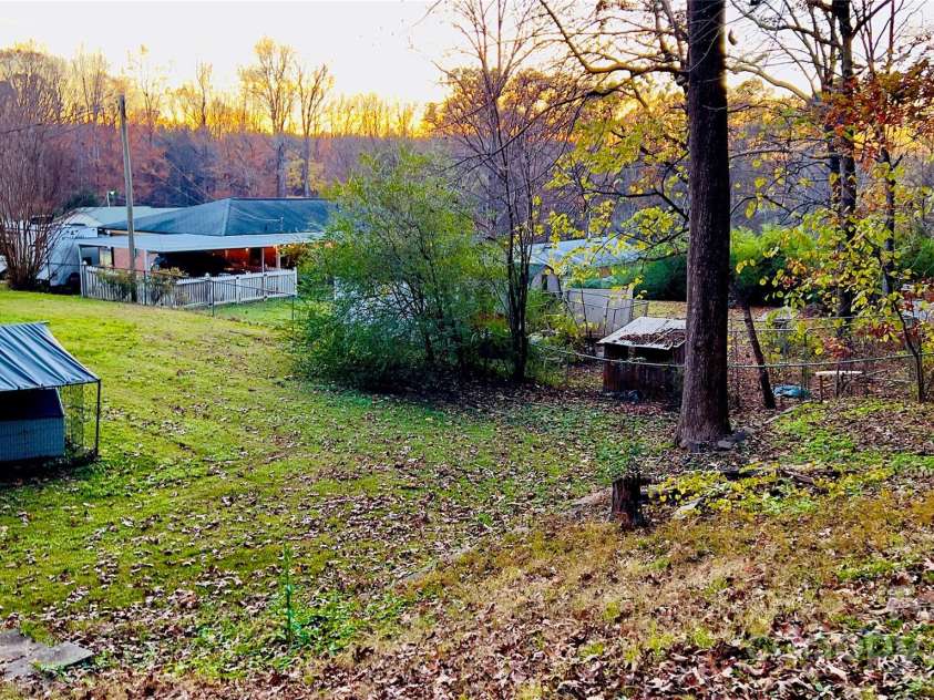 124 Riley Road, Dallas, NC 28034.  MLS# CAR4244655, YatesRealty ID 4753. Part of the almost 1/2 acre! Build up or out!