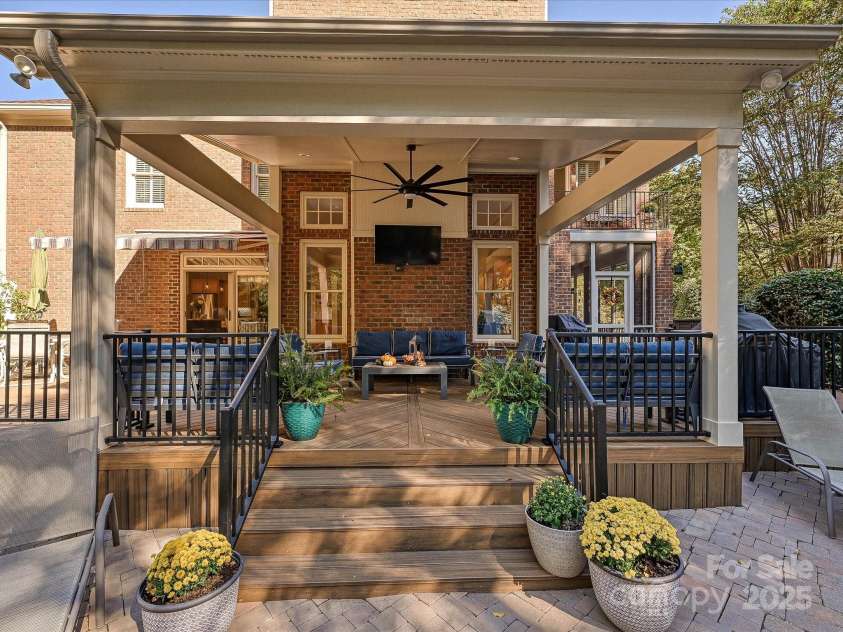 16128 Bridgehampton Club Drive, Charlotte, NC 28277.  MLS# CAR4308778, YatesRealty ID 4753. Covered outdoor living area for year round entertaining.