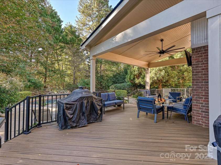 16128 Bridgehampton Club Drive, Charlotte, NC 28277.  MLS# CAR4308778, YatesRealty ID 4753. Off screened porch and flows around back 
