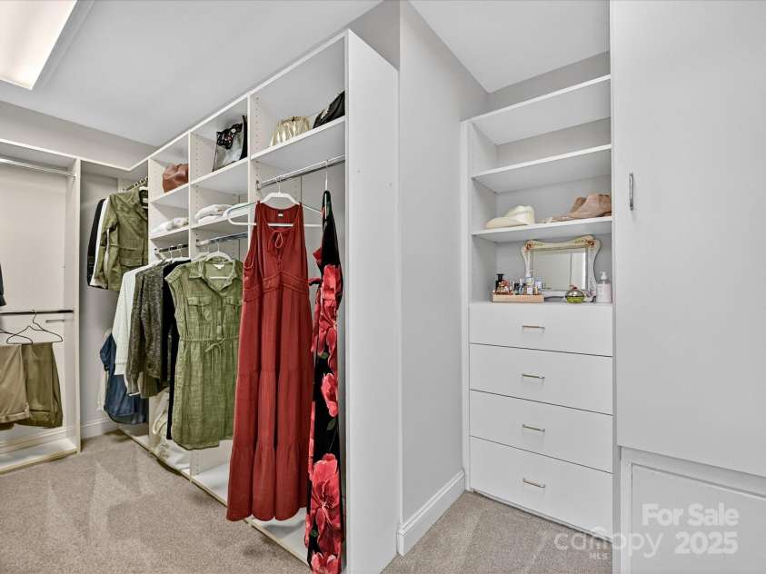 16128 Bridgehampton Club Drive, Charlotte, NC 28277.  MLS# CAR4308778, YatesRealty ID 4753. Primary custom closet.