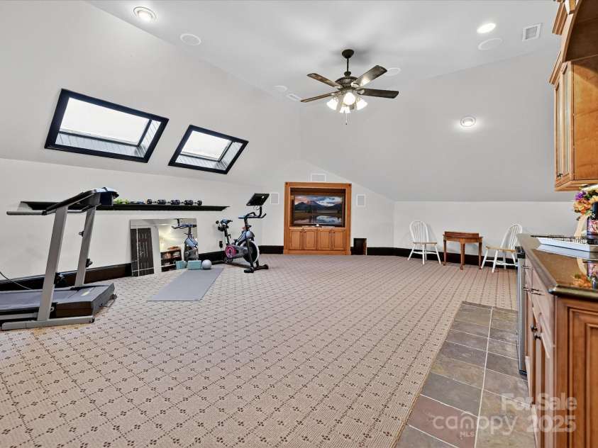 16128 Bridgehampton Club Drive, Charlotte, NC 28277.  MLS# CAR4308778, YatesRealty ID 4753. Rec/Bonus on open third floor with vaulted ceiling. 