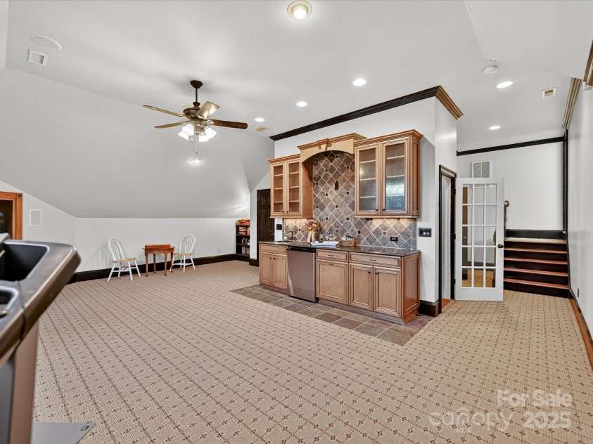 16128 Bridgehampton Club Drive, Charlotte, NC 28277.  MLS# CAR4308778, YatesRealty ID 4753. Rec/Bonus with full wet bar for entertaining, 