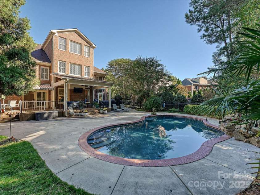 16128 Bridgehampton Club Drive, Charlotte, NC 28277.  MLS# CAR4308778, YatesRealty ID 4753. Salt water pool with oversized pool deck