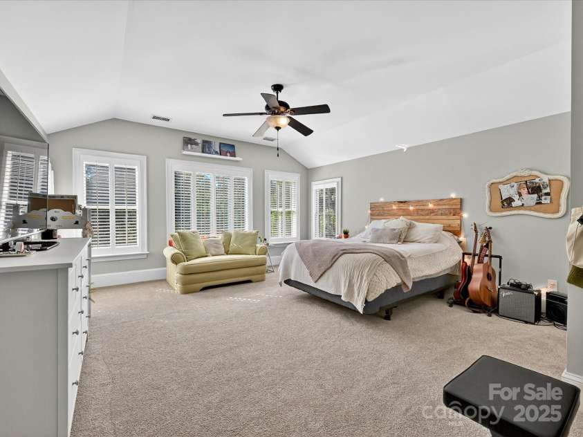 16128 Bridgehampton Club Drive, Charlotte, NC 28277.  MLS# CAR4308778, YatesRealty ID 4753. Third floor bedroom 5 with vaulted ceiling. 