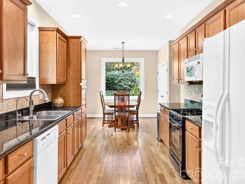 22 Banks Town Road, Weaverville, NC 28787.  MLS# CAR4417947, YatesRealty ID 47532. View into kitchen