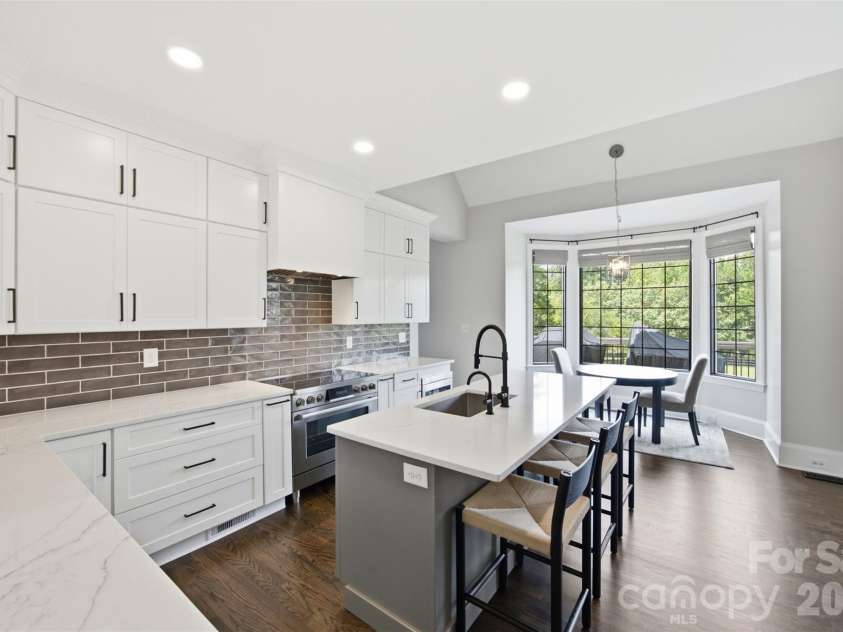 1002 Heather Glen Drive, Matthews, NC 28104.  MLS# CAR4418895, YatesRealty ID 47535. 