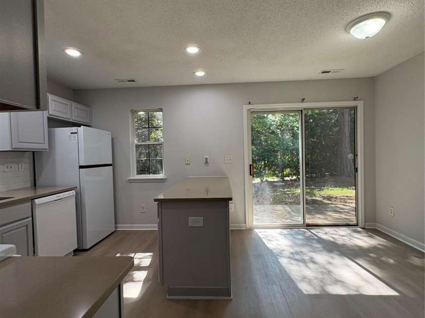11586 Briddle Hall Court, Charlotte, NC 28214.  MLS# CAR4419064, YatesRealty ID 47547. Kitchen and dining area