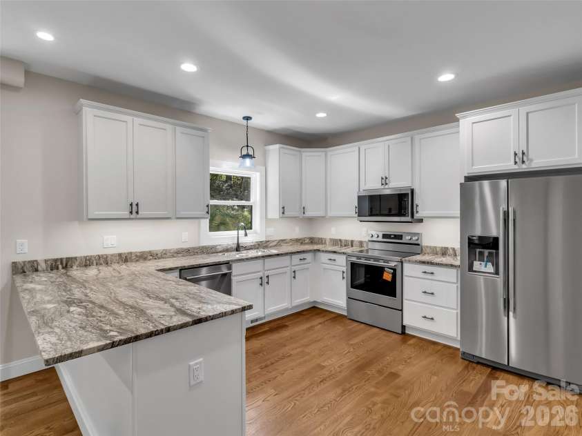 146 Bradford Park, Clyde, NC 28721.  MLS# CAR4419307, YatesRealty ID 47549. Leathered Granite