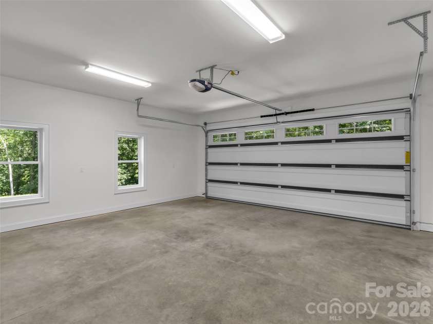 146 Bradford Park, Clyde, NC 28721.  MLS# CAR4419307, YatesRealty ID 47549. Oversized Double Garage