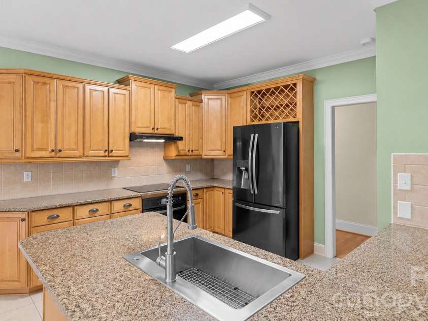 265 Westminster Court, Asheboro, NC 27205.  MLS# CAR4388948, YatesRealty ID 47550. Kitchen view 1