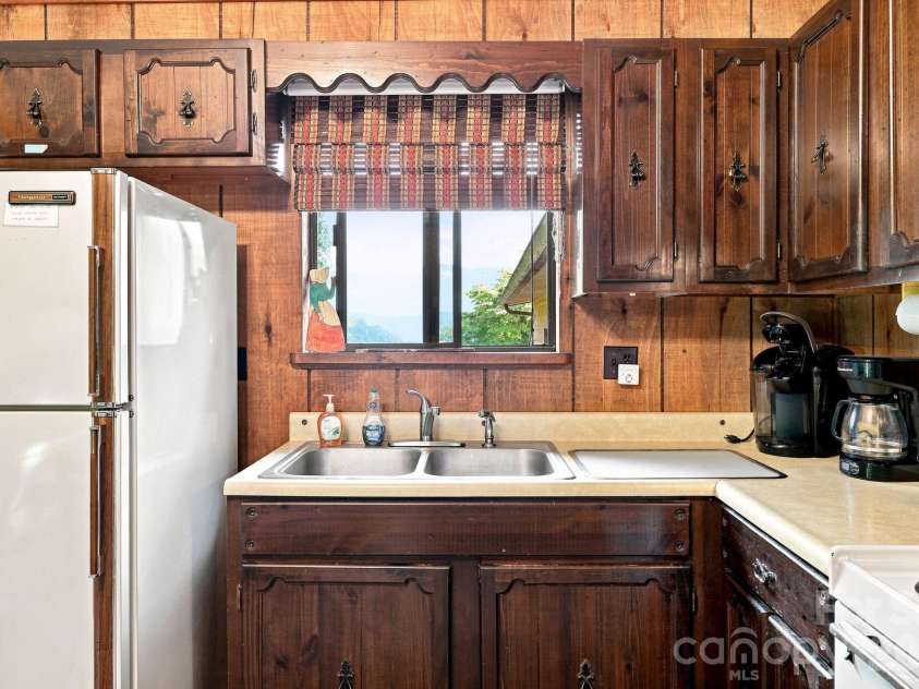 128 Wildcherry Hill Road, Maggie Valley, NC 28751.  MLS# CAR4416559, YatesRealty ID 47559. 