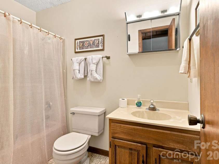 128 Wildcherry Hill Road, Maggie Valley, NC 28751.  MLS# CAR4416559, YatesRealty ID 47559. 