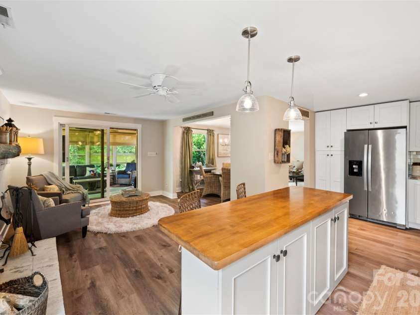 5934 Tillery Drive, Charlotte, NC 28226.  MLS# CAR4417835, YatesRealty ID 47561. Kitchen opens to den/lounge area
