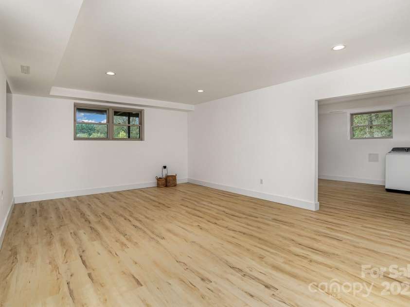 7407 Forney Hill Road, Denver, NC 28037.  MLS# CAR4222546, YatesRealty ID 4757. Down stairs living room/game rrom