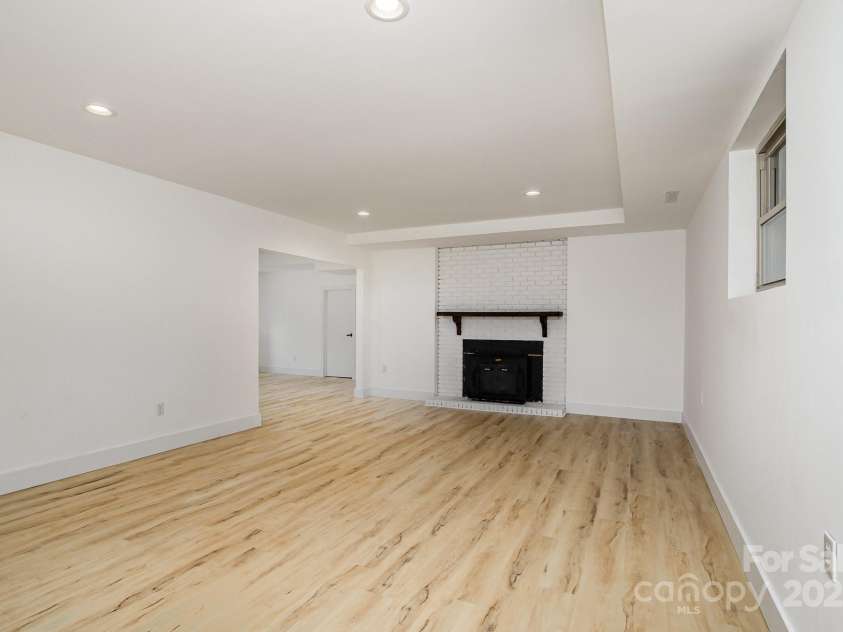 7407 Forney Hill Road, Denver, NC 28037.  MLS# CAR4222546, YatesRealty ID 4757. Downstairs Lving/Game Room