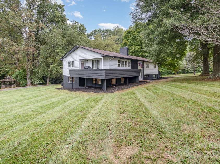 7407 Forney Hill Road, Denver, NC 28037.  MLS# CAR4222546, YatesRealty ID 4757. Side porch with wrapped around front porch