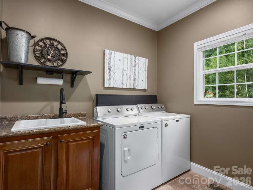 64 Luther Cove Road, Candler, NC 28715.  MLS# CAR4419365, YatesRealty ID 47581. 