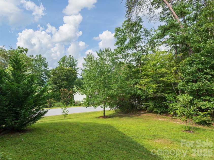 64 Luther Cove Road, Candler, NC 28715.  MLS# CAR4419365, YatesRealty ID 47581. 